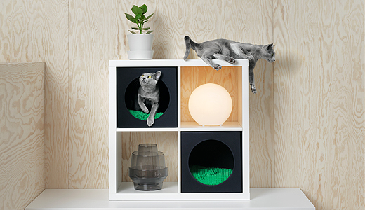 IKEA Cats lounging in style in this Cat House.